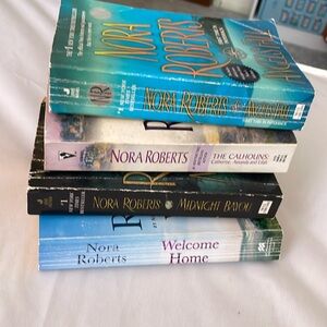 4 Nora Robert’s paperback Books